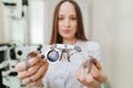 ophthalmologist with trial frame for selection of glasses. selective focus Royalty Free Stock Photo