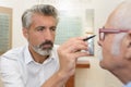Ophthalmologist at work in eye clinic