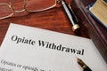 Opiate withdrawal written on a paper. Royalty Free Stock Photo