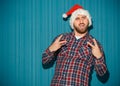 The opinionated christmas man wearing a santa hat Royalty Free Stock Photo