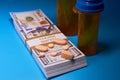Opioid crisis drugs pills prescription medication and money Royalty Free Stock Photo