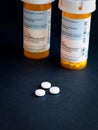 Opioid Crisis - Open Bottle of Prescription Painkillers. Medicare, overdose. Royalty Free Stock Photo