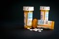 Opioid Crisis - Open Bottle of Prescription Painkillers. Medicare, overdose. Royalty Free Stock Photo