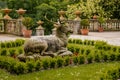 Opocno castle, renaissance chateau, courtyard with arcades and red facade, palm trees and plants in ceramic pots, deer statue,