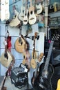 Portuguese guitar and other string instruments in a showcase