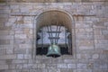 View at the Porto Cathedral facade, SÃÂ© do Porto, detailed bell and granite wall stone