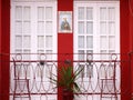 Oporto tipical balcony house with catolic figure