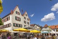 People enjoy a summer day at Market Place of Oppenheim, Germany during the corona season Royalty Free Stock Photo