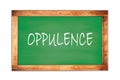 OPPULENCE text written on green school board Royalty Free Stock Photo