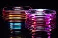 optical discs stacked on a shiny black surface Royalty Free Stock Photo
