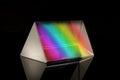 Optical prism for experiments isolated on the black background Royalty Free Stock Photo