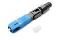 Optical SC blue connector on an isolated background close-up, for connecting to the Internet, television or local area network,