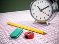 Optical test paper, alarm clock, eraser, pencil and sharpener. 3D illustration