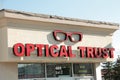 tor, canada - july 31, 2023: optical trust optometrist eye care eyeglasses storefront entrance logo. p