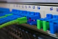 Optical wires connect with the patch panel. Laser beam close up Royalty Free Stock Photo