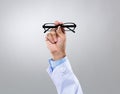 Optician doctor hold with eye glasses Royalty Free Stock Photo