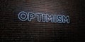 OPTIMISM -Realistic Neon Sign on Brick Wall background - 3D rendered royalty free stock image