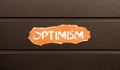 Optimism Word Written In red torn paper Royalty Free Stock Photo