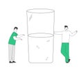 Optimist and Pessimist. Couple of Male Characters Stand at Huge Water Glass Discussing if it is Half Full or Empty Royalty Free Stock Photo