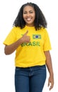 Optimistic brazilian female soccer fan Royalty Free Stock Photo
