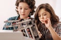 Optimistic children programming robot in the science studio