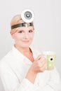 Optimistic female doctor with cup of coffe Royalty Free Stock Photo
