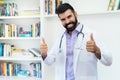 Optimistic hispanic mature doctor with beard Royalty Free Stock Photo