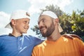 Optimistic man and kid telling outside Royalty Free Stock Photo