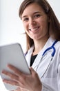 Optimistic medical professional embraces digital tools