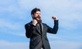 Optimistic mood. Success and luck. Being optimistic. Man bearded optimistic businessman wear formal suit sky background Royalty Free Stock Photo