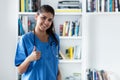 Optimistic young adult spanish female nurse or medical student Royalty Free Stock Photo