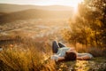 Optimistic young woman listening to music podcast stream over headphones,enjoying in nature at sunset.Musical therapy Royalty Free Stock Photo