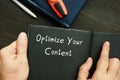 Optimize Your Content sign on the piece of paper Royalty Free Stock Photo
