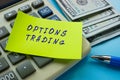 OPTIONS TRADING sign on the sheet
