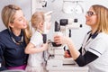 Optometrist checking little child's vision