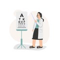 The optometrist stands with a pointer and points to a stand to test vision