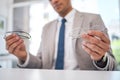 Optometry, choice and closeup of a man with glasses for eye care, optical wellness or health. Vision, healthcare and