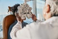 Optometry, healthcare and optometrist doing a eye test for a patient for vision or eyecare in a clinic. Ophthalmology Royalty Free Stock Photo