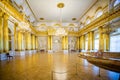 Opulent gold chandaliered state room in The Hermitage Museum in St Petersburg, Russia
