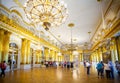 Opulent gold chandaliered state room in The Hermitage Museum in St Petersburg, Russia