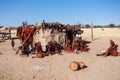 Opuwo, Namibia - Jul 07, 2019: Himba women with the typical necklace and hairstyle in himba tribe village