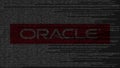 Oracle Corporation logo made of source code on computer screen. Editorial 3D rendering