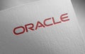Oracle-6 on paper texture logo Royalty Free Stock Photo
