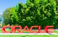 Oracle logo at company headquarters in Silicon Valley with green landscape Royalty Free Stock Photo