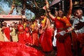 Oracles wearing red dress dance in trance Royalty Free Stock Photo