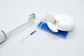 Oral Care: electric toothbrush, dental floss and brushes for interdental spaces on white background Royalty Free Stock Photo