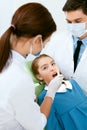 Oral Health Care. Dentist Doctors Making Examination Procedure