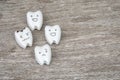 Oral health icon - cute healthy and crying decayed teeth