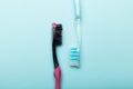 Oral hygiene, toothbrushes. Blue background.