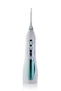 Oral irrigator on a white background Royalty Free Stock Photo